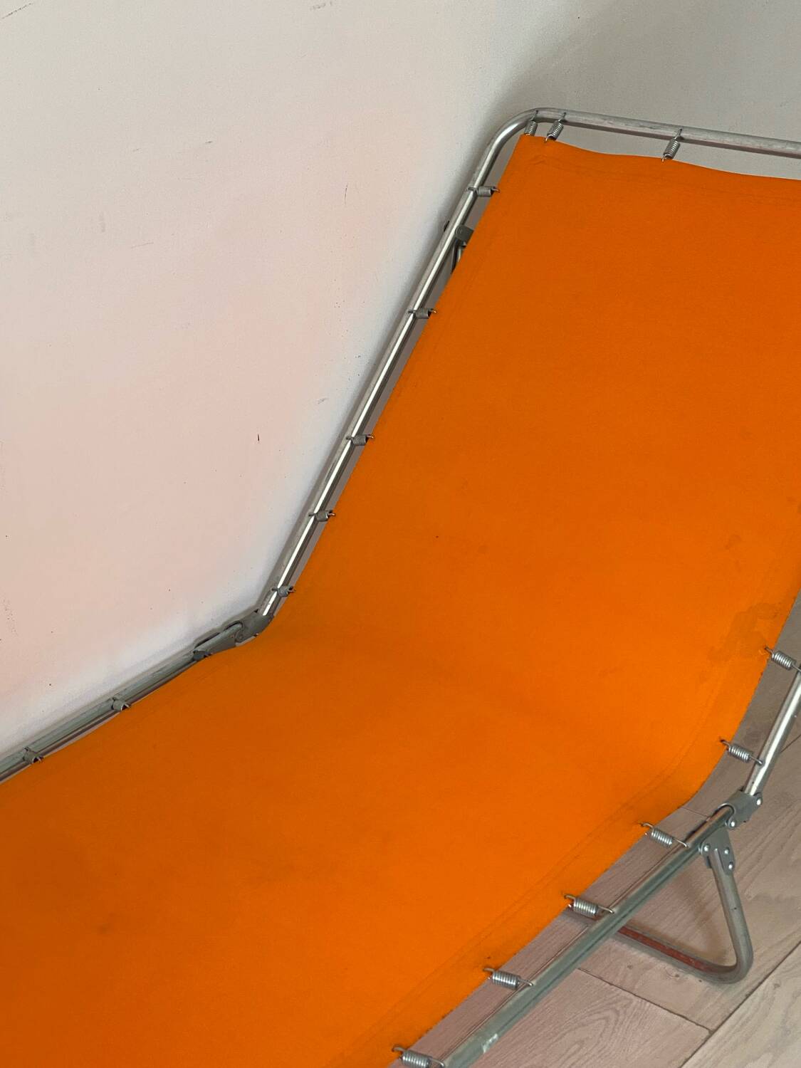 Orange and metal deckchair 1970