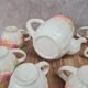 Adorable little vintage tea set in coloured earthenware.