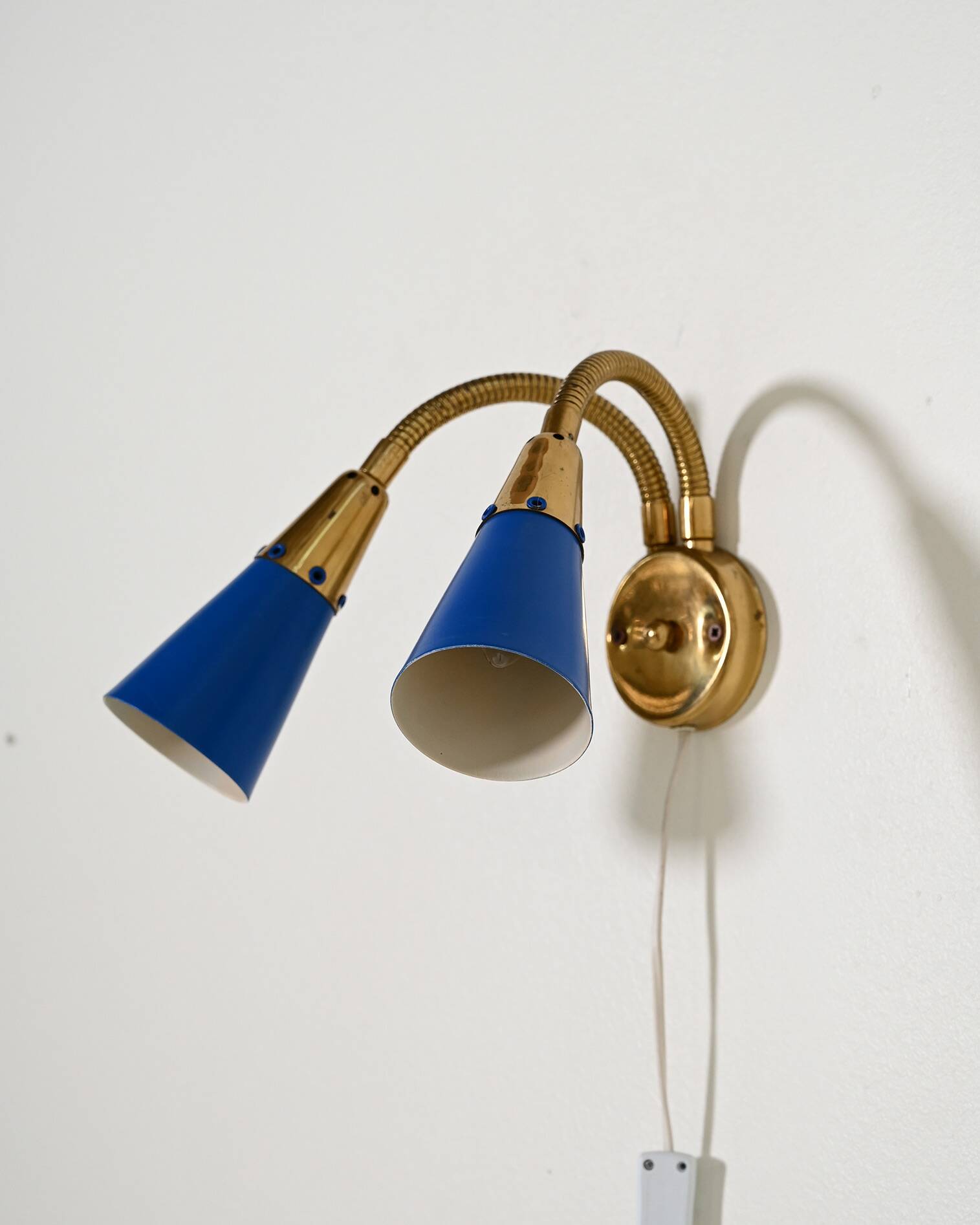 Adjustable brass and lacquered metal wall lamp, Scandinavia, 1960s