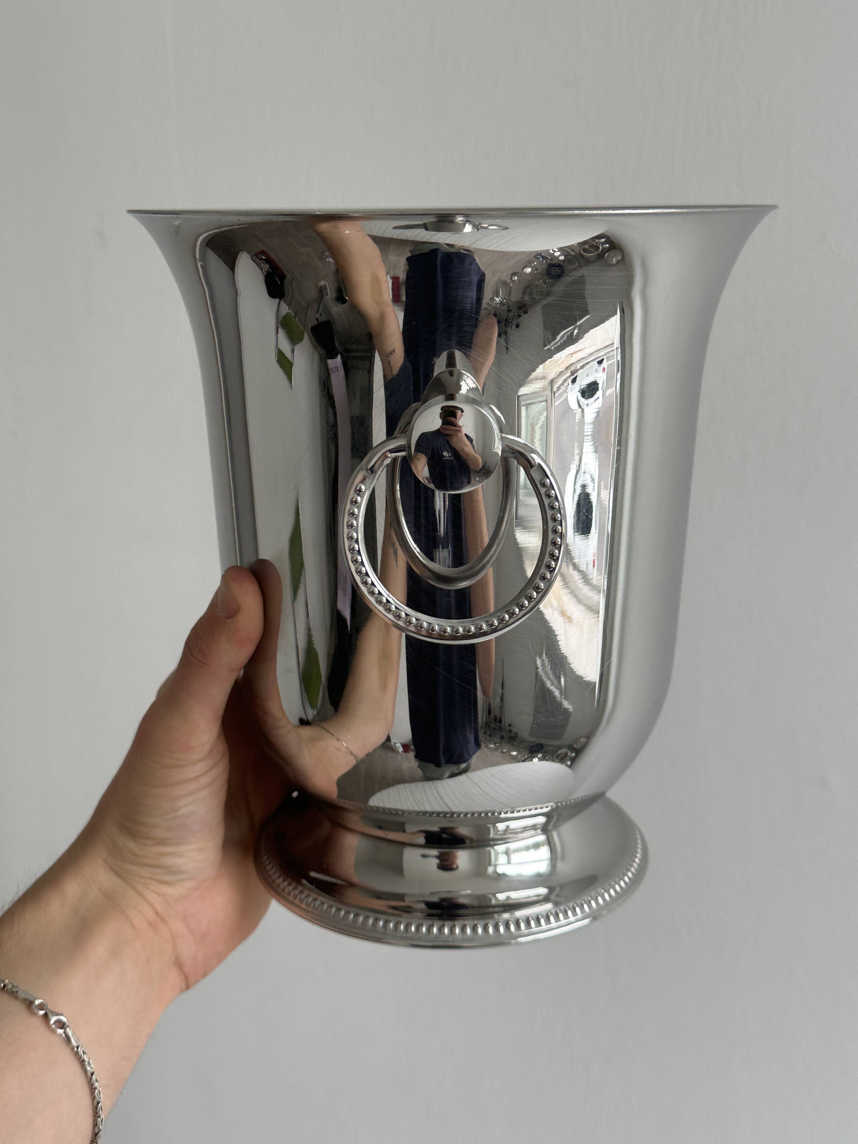 Shiny silver metal champagne bucket