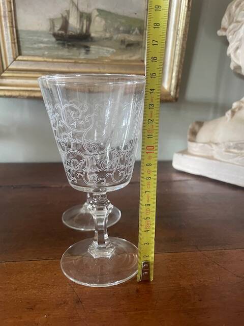 2 large engraved water glasses in arabesque.