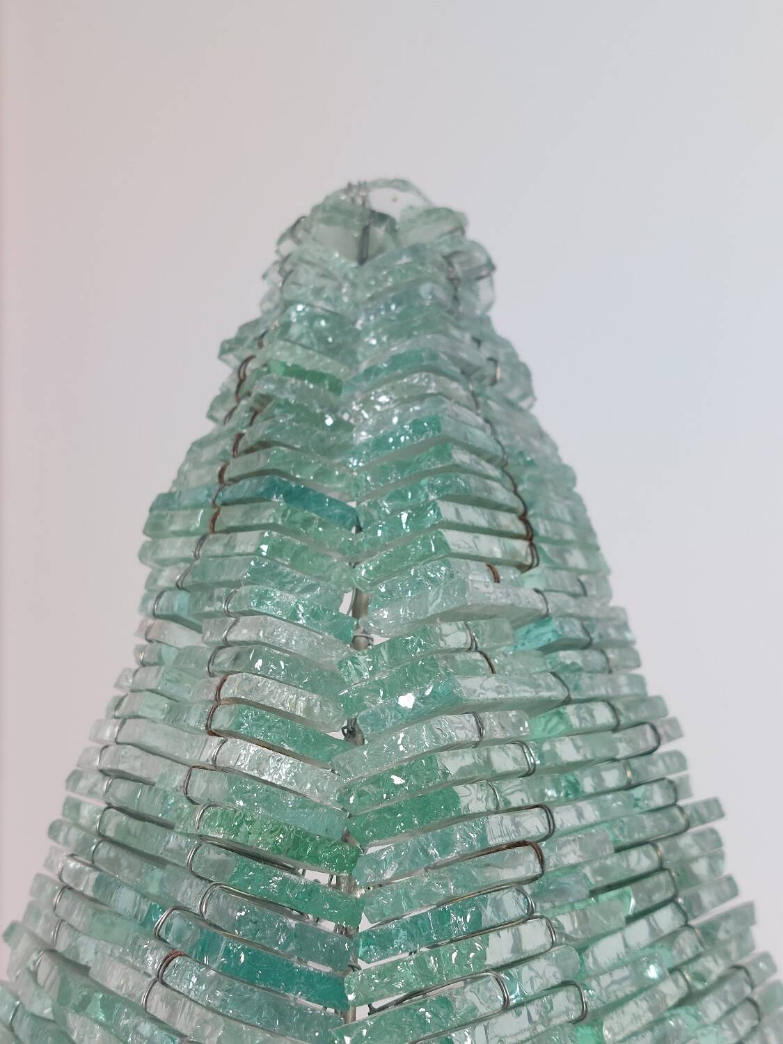 Pair of pyramid-shaped wall sconces in glass in vintage French style.