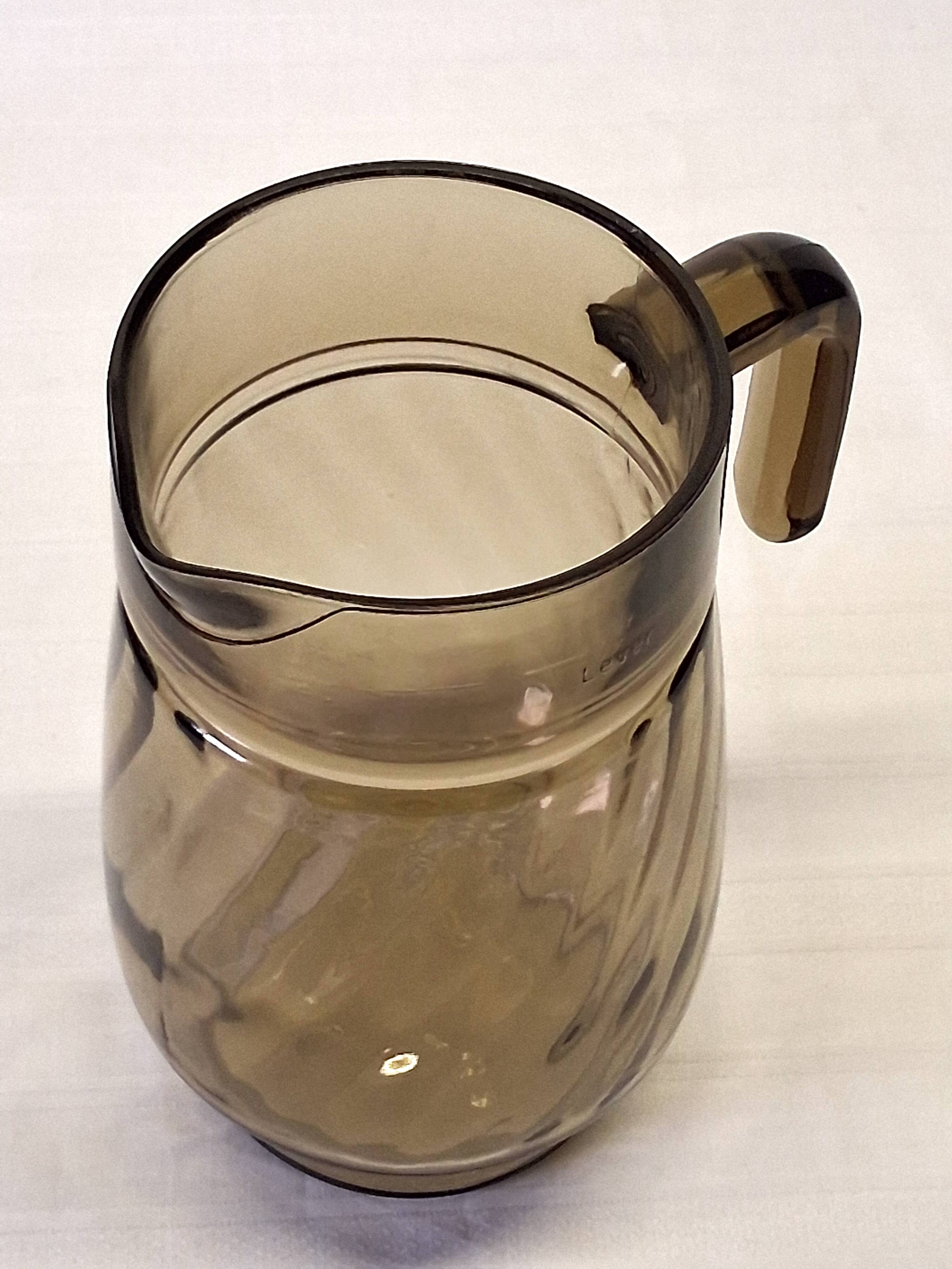 Very pretty black smoked glass pitcher from Lever in very good condition.