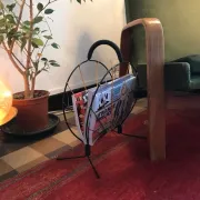 Vintage wire magazine rack from the 1950s.