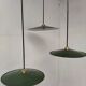 Suspensions in enamelled sheets