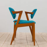 Pair of 42 Kai Kristiansen teak chairs in original blue bouclé upholstery, Denmark, 60s.