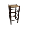 High wooden stool and straw