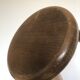 Low tripod stool in solid wood