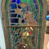 Stained glass panel representing a nineteenth century coronation