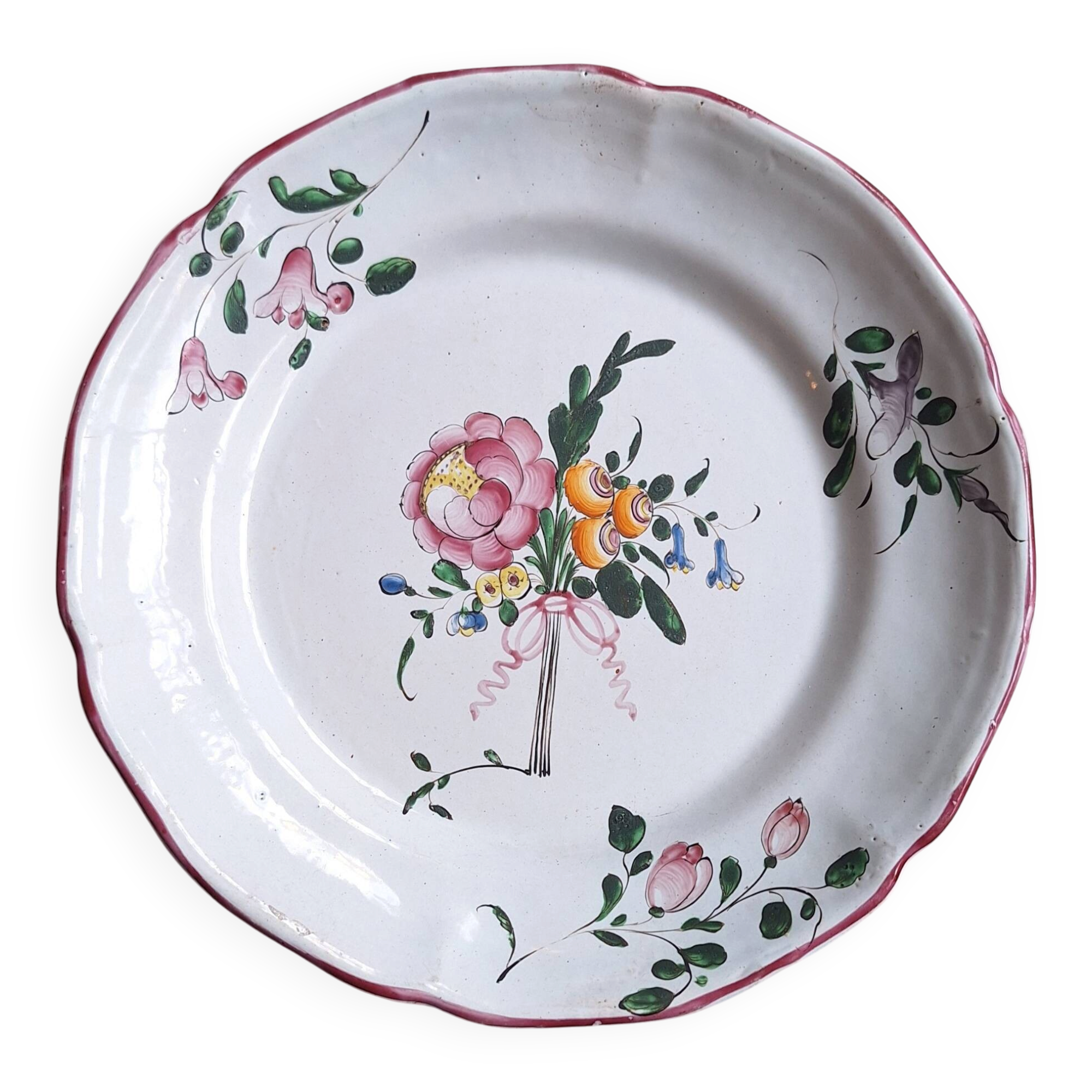 Hand-painted earthenware plate from eastern France, 18th century.