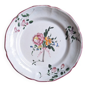 Hand-painted earthenware plate from eastern France, 18th century.