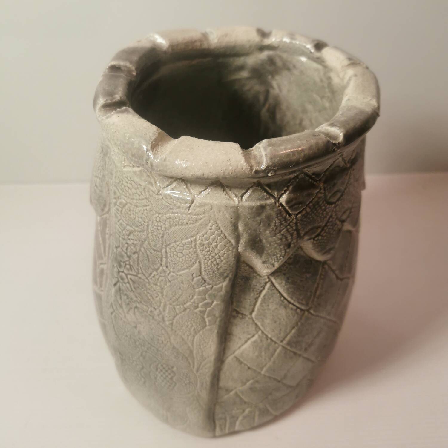Ceramic vase or pot in gray beige color