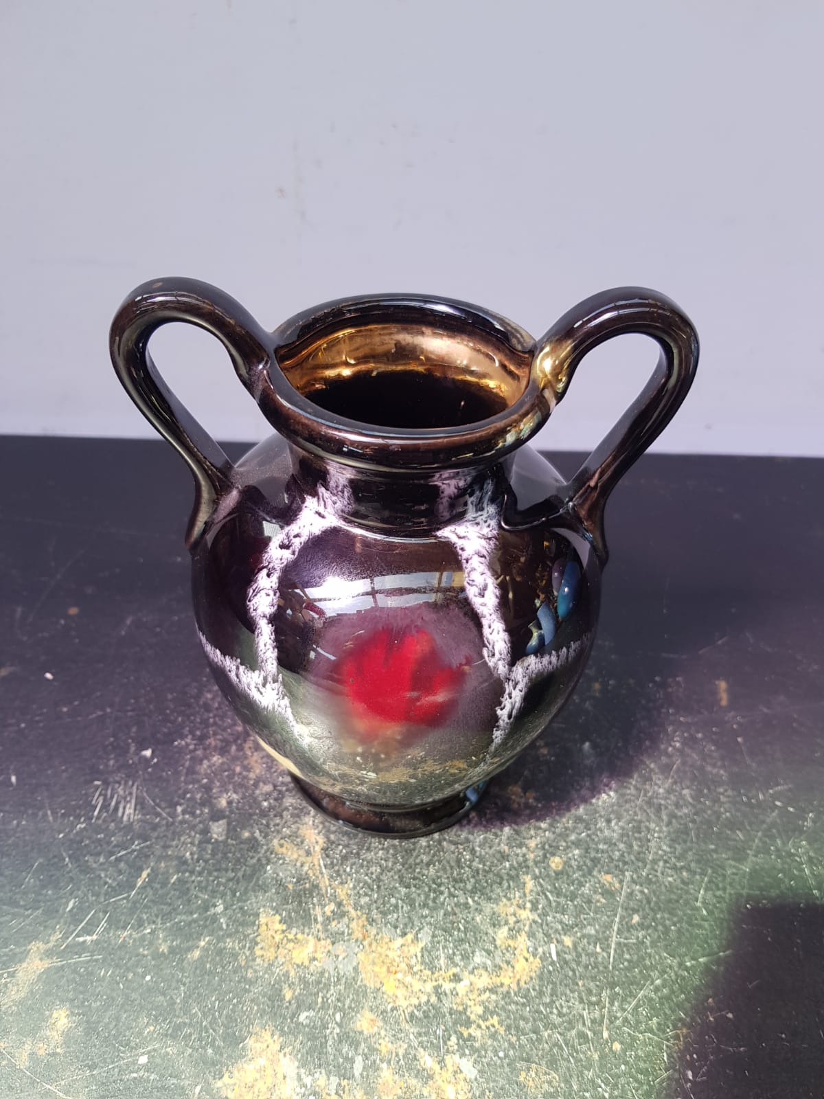 Old vase with coves ceramic black