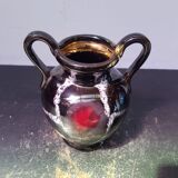 Old vase with coves ceramic black