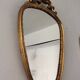 Old vintage mirror in gilded wood