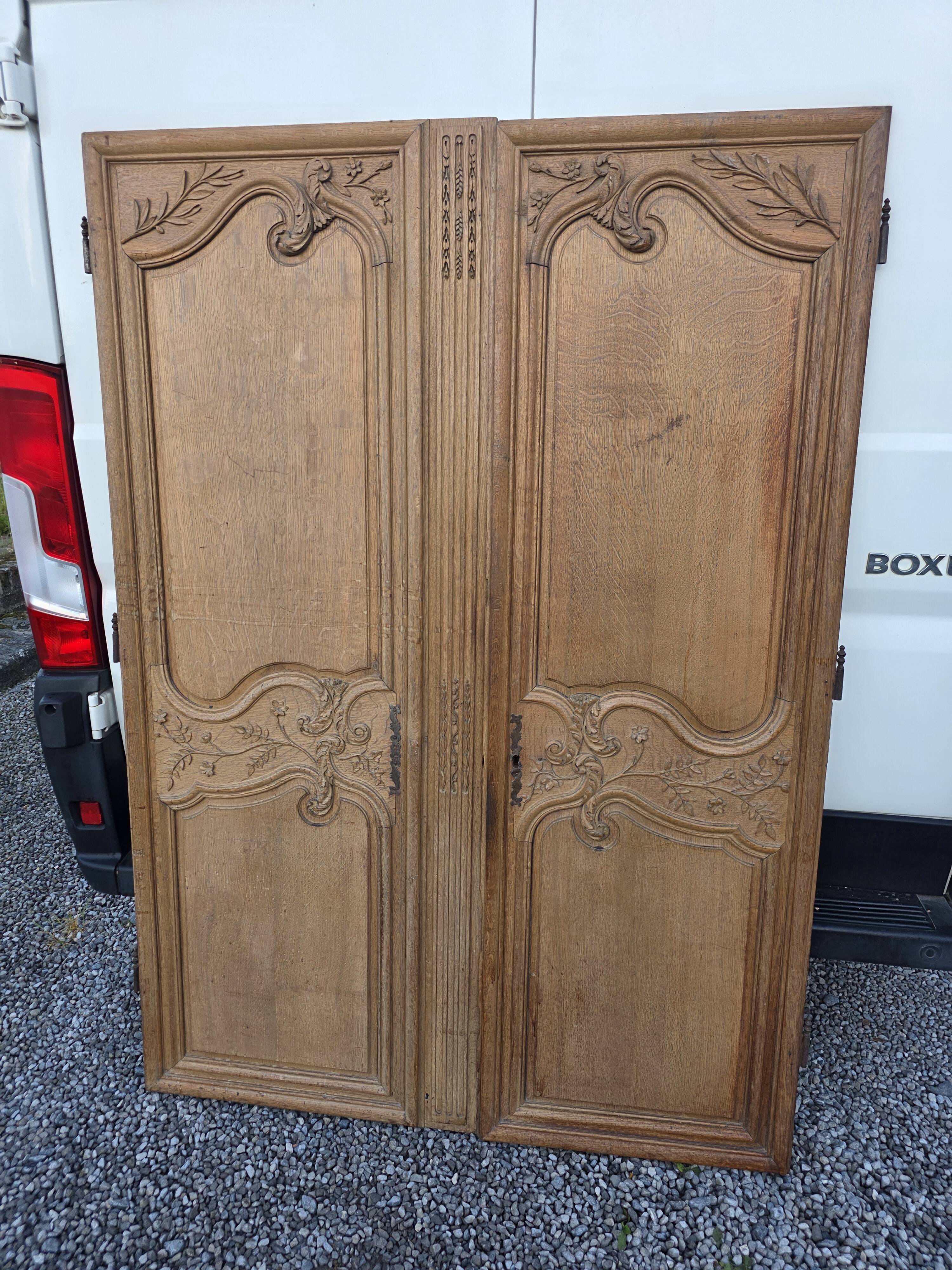 Pair of solid oak wardrobe doors from the 19th century.