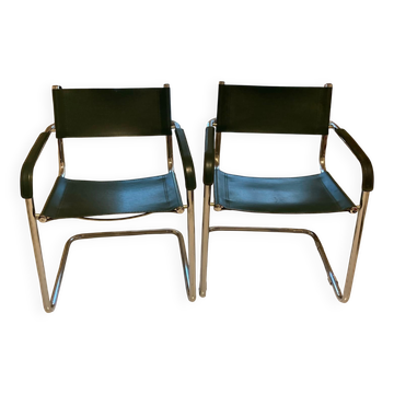 Pair of vintage cantilever armchairs in green leather & chrome