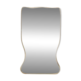 Golden brass mirror in the style of Gio Ponti and the 1980s.