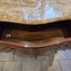 Louis XV style commode with marquetry and marble.