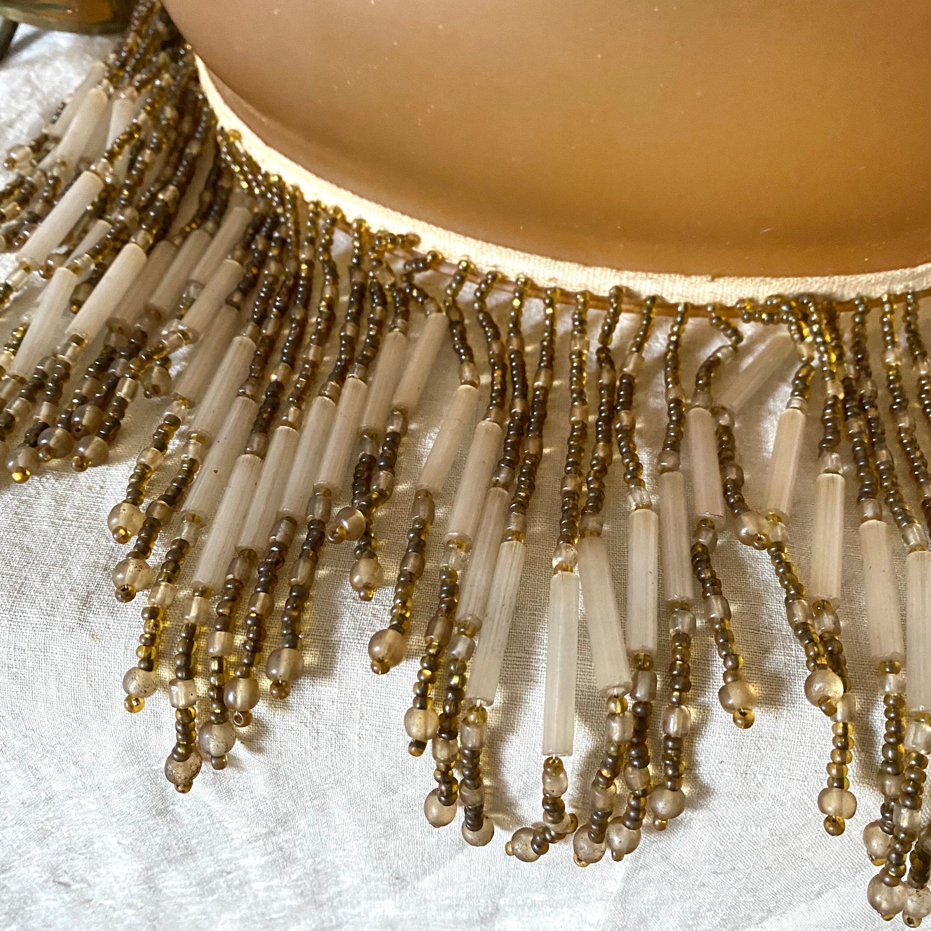 Amber polished glass and pearl suspension