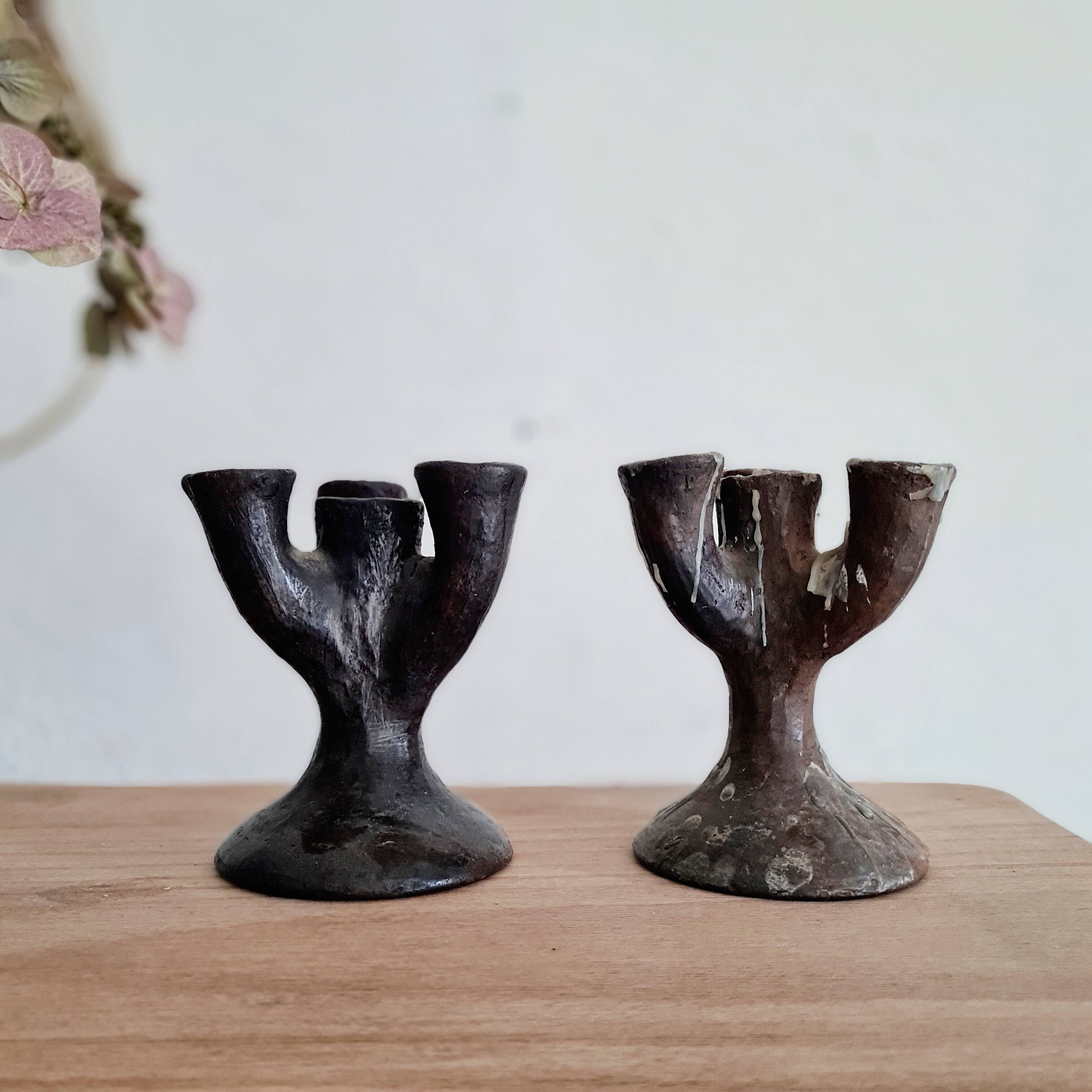 Antique terracotta candlesticks