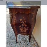 Chest of drawers Chest of drawers with curved marquetry front and sides opening with three drawers on three rows