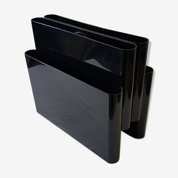 Kartell magazine holder by Giotto Stopino