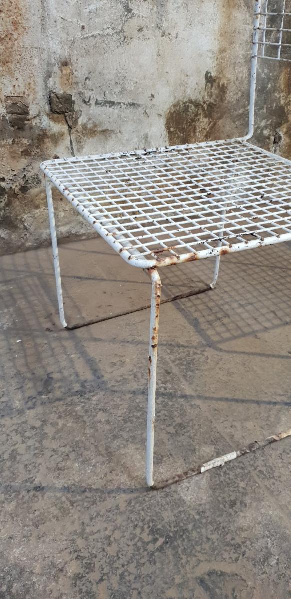 Two vintage metal chairs