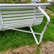 Antique garden bench with metal legs