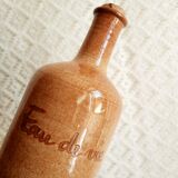 Vintage Mongolfier stoneware brandy bottle