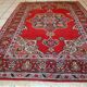 Tapis vintage fait main Kazvin en laine rouge vif (100cm x 144cm)