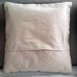 Set of three old hand-embroidered wool cushions