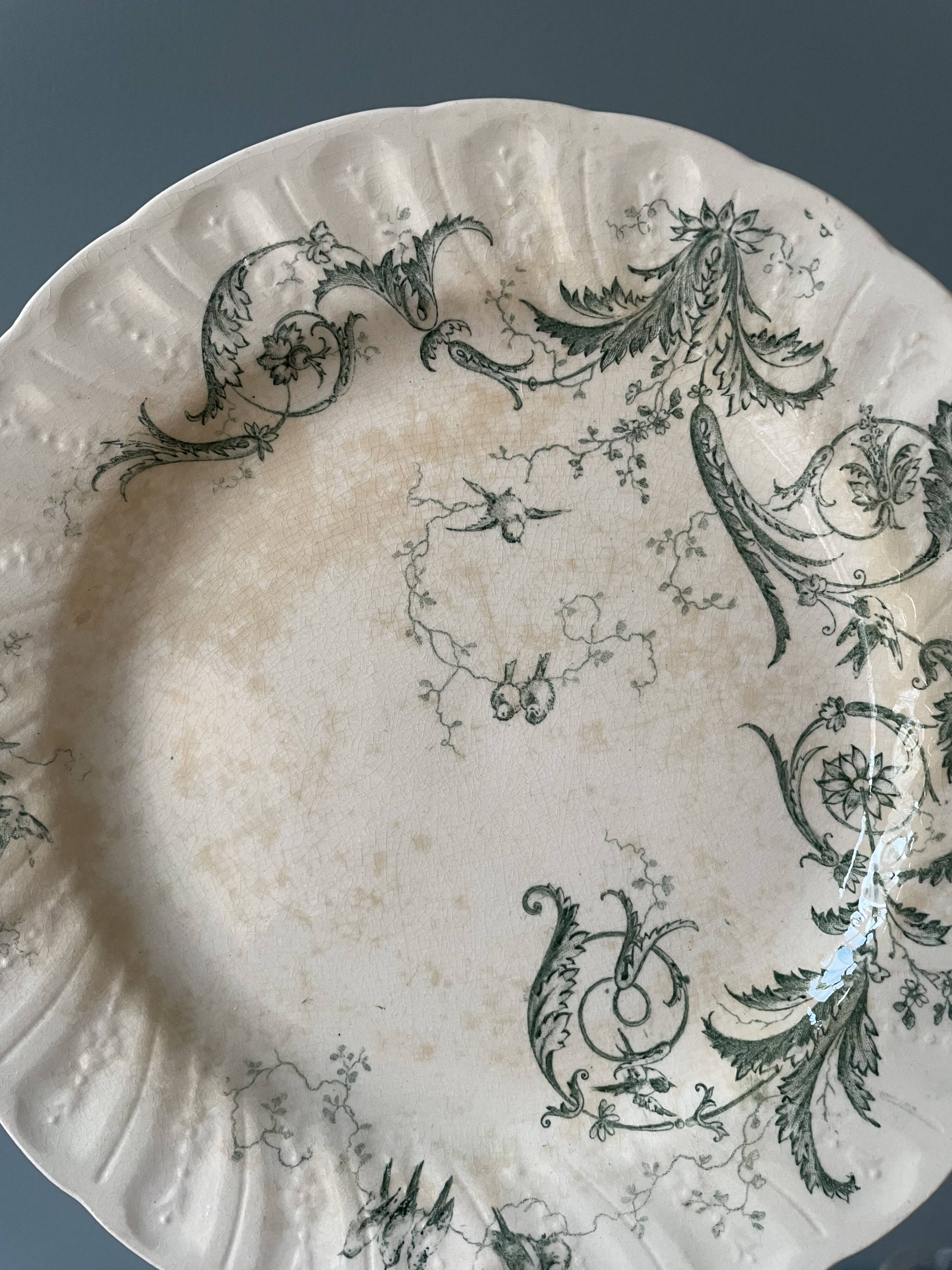 Set of 12 flat plates Terre De Fer XIXth in opaque porcelain of Gien, model Rinceaux