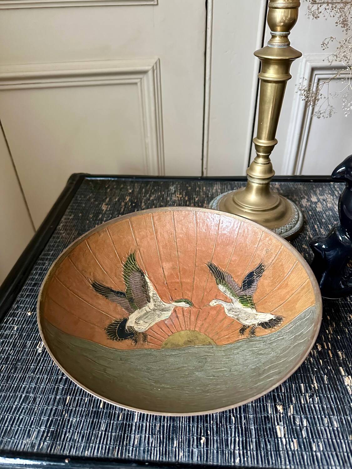 Enameled brass pocket emptier