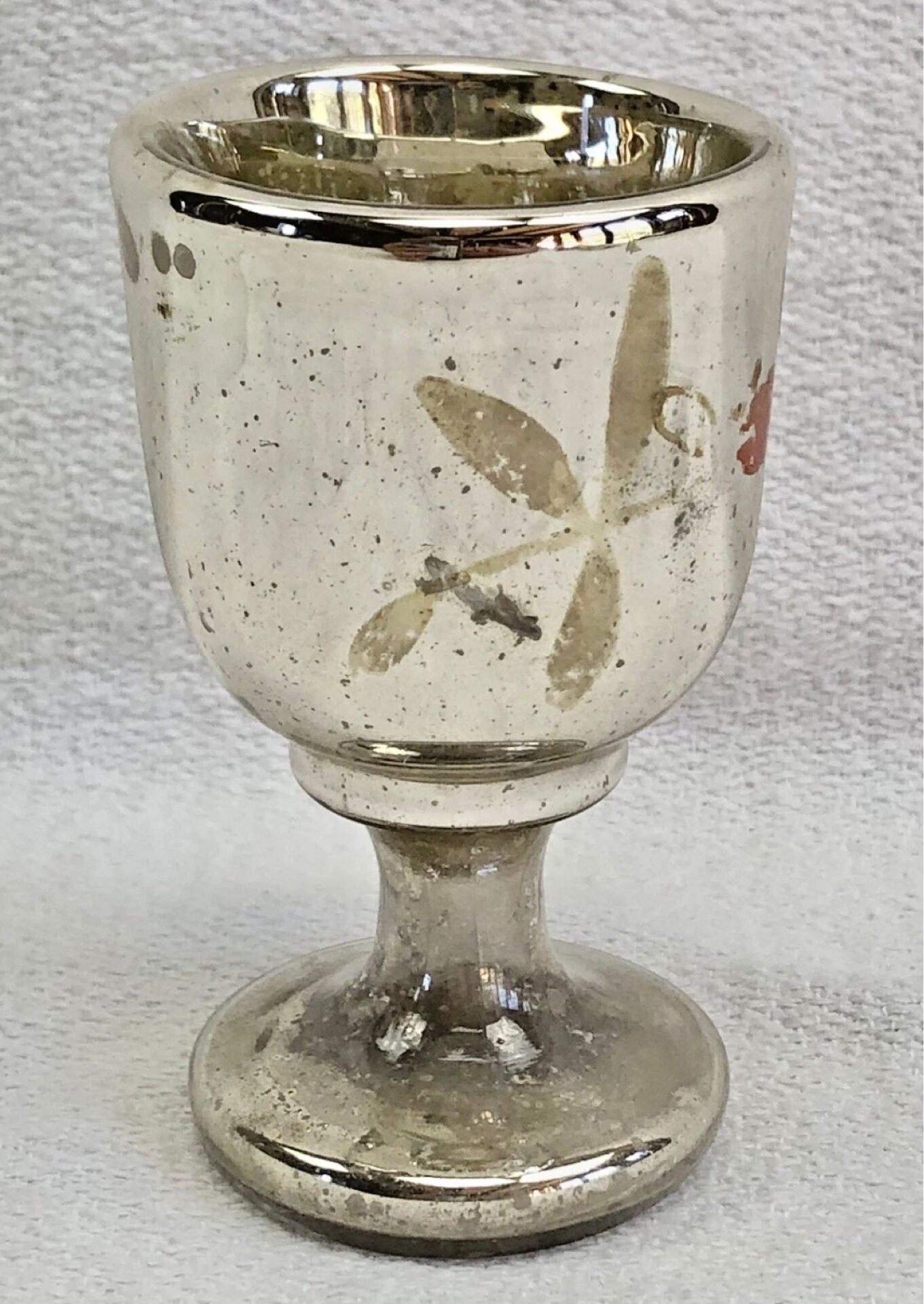 Painted blown glass egg cup with mercury gilding, 19th century.