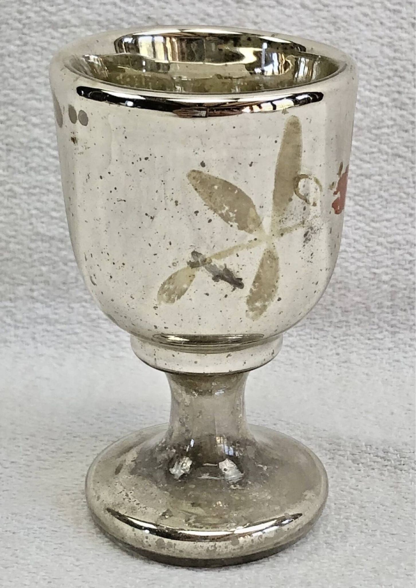Painted blown glass egg cup with mercury gilding, 19th century.