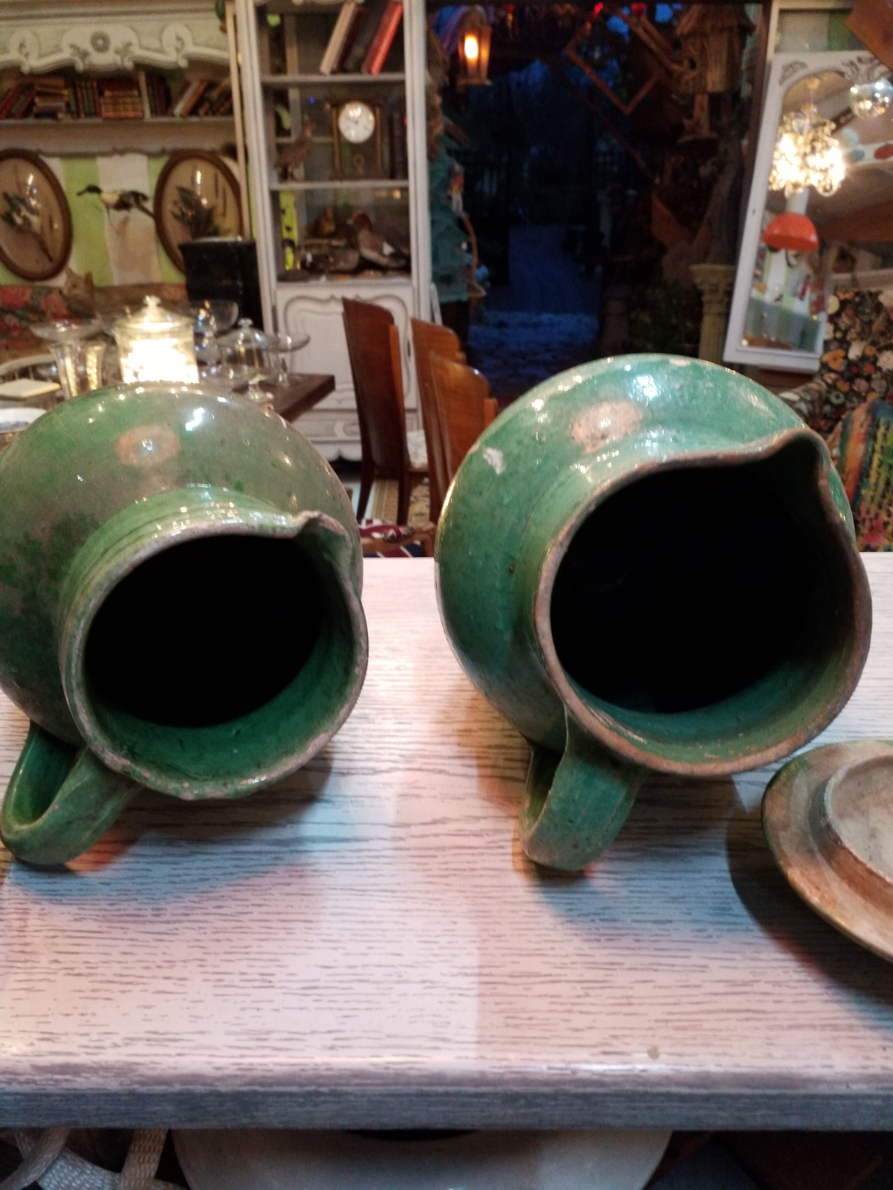 Pairs of jugs in varnished earth