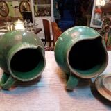 Pairs of jugs in varnished earth