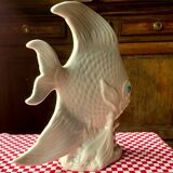 Large white ceramic fish to place.