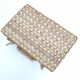 Suitcase in rattan and woven wicker