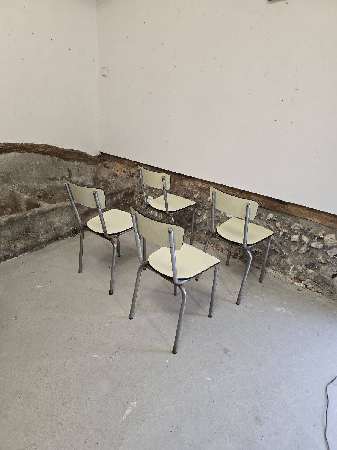 Set of 4 light yellow formica chairs