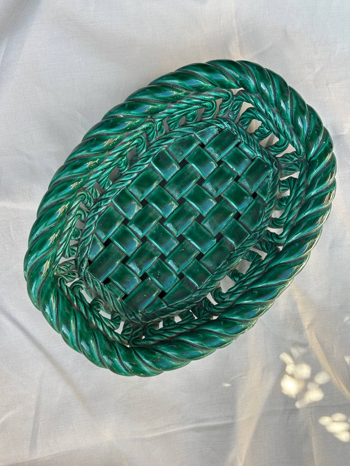 Green woven ceramic basket