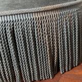 Pouf capitonné en velours