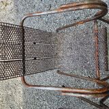 Pair of perforated metal armchairs by René Malaval 1950