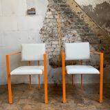 Pair of postmodern orange armchairs and bouclé wool fabric