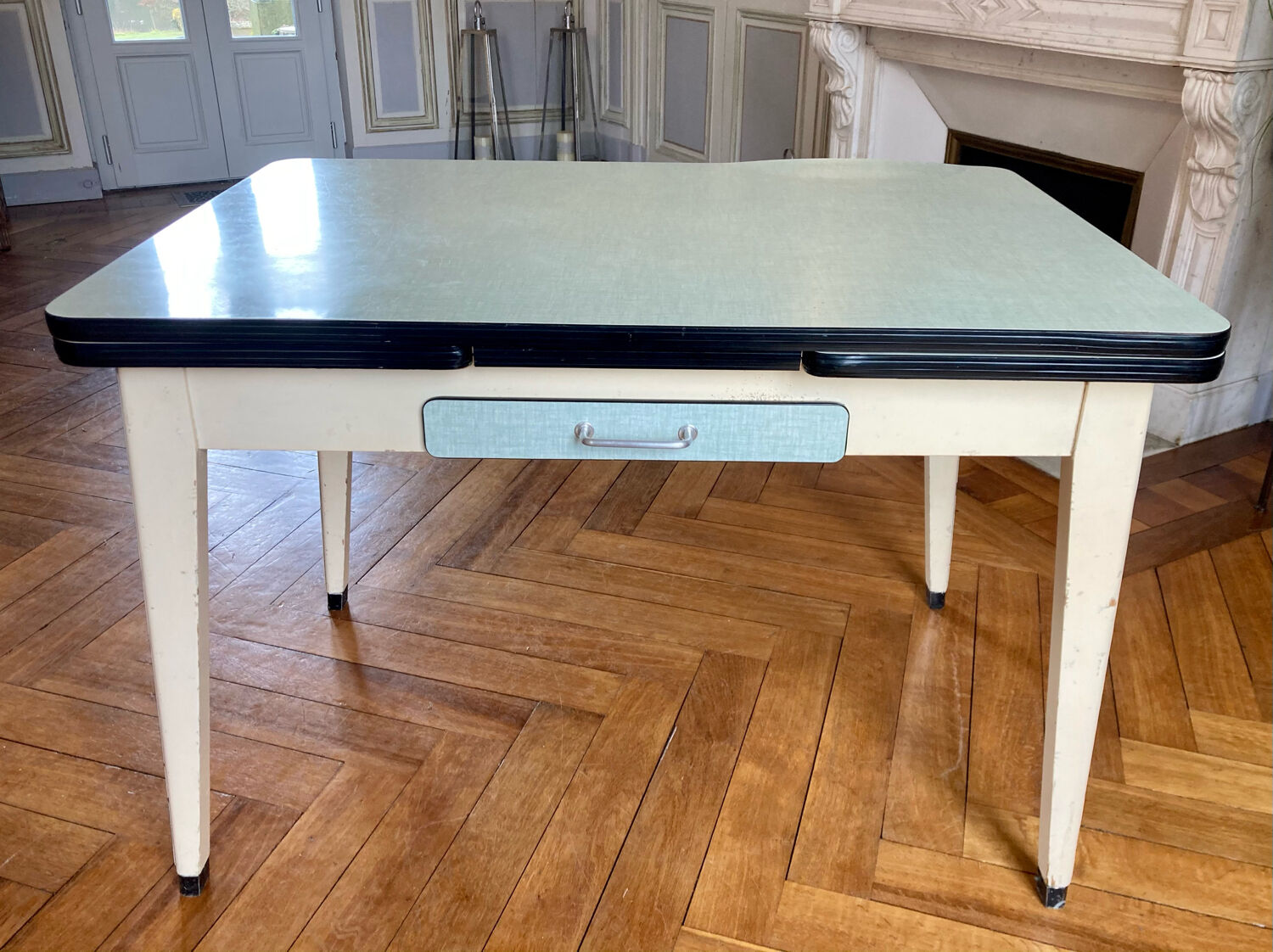 Water-green extendable Formica table
