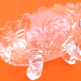 1970s oblong cup, empty pocket on 4 small feet glass decoration in relief