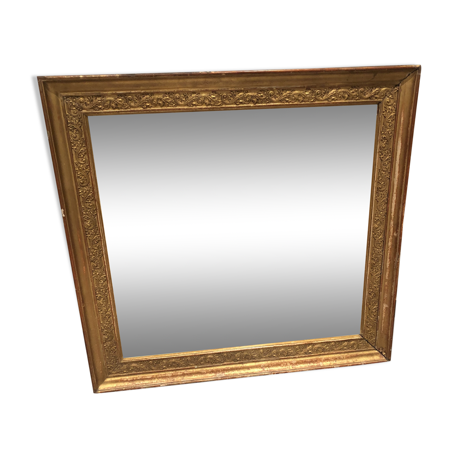 Old 19th century mirror in wood and gilded stucco