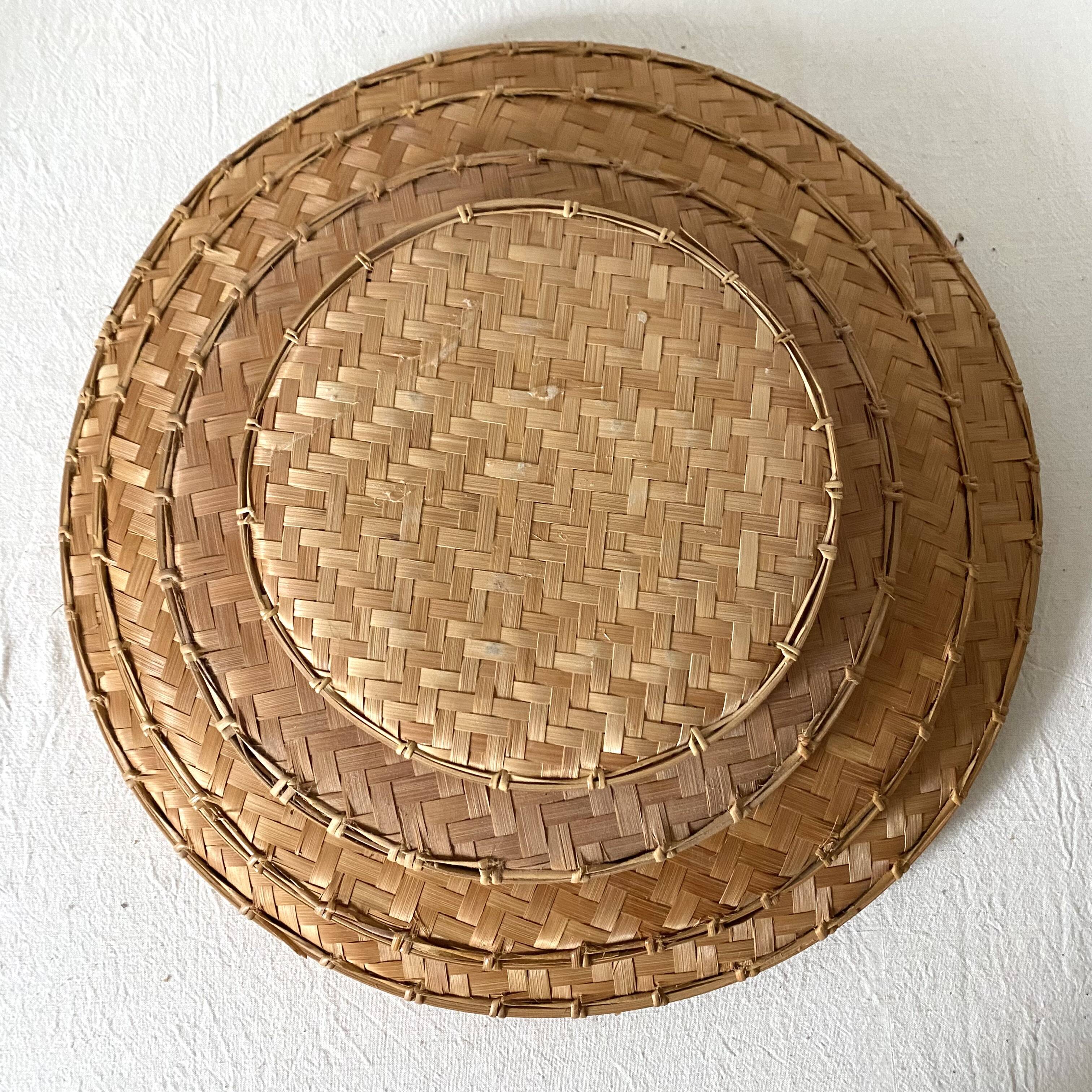 Round nesting trays in woven bamboo