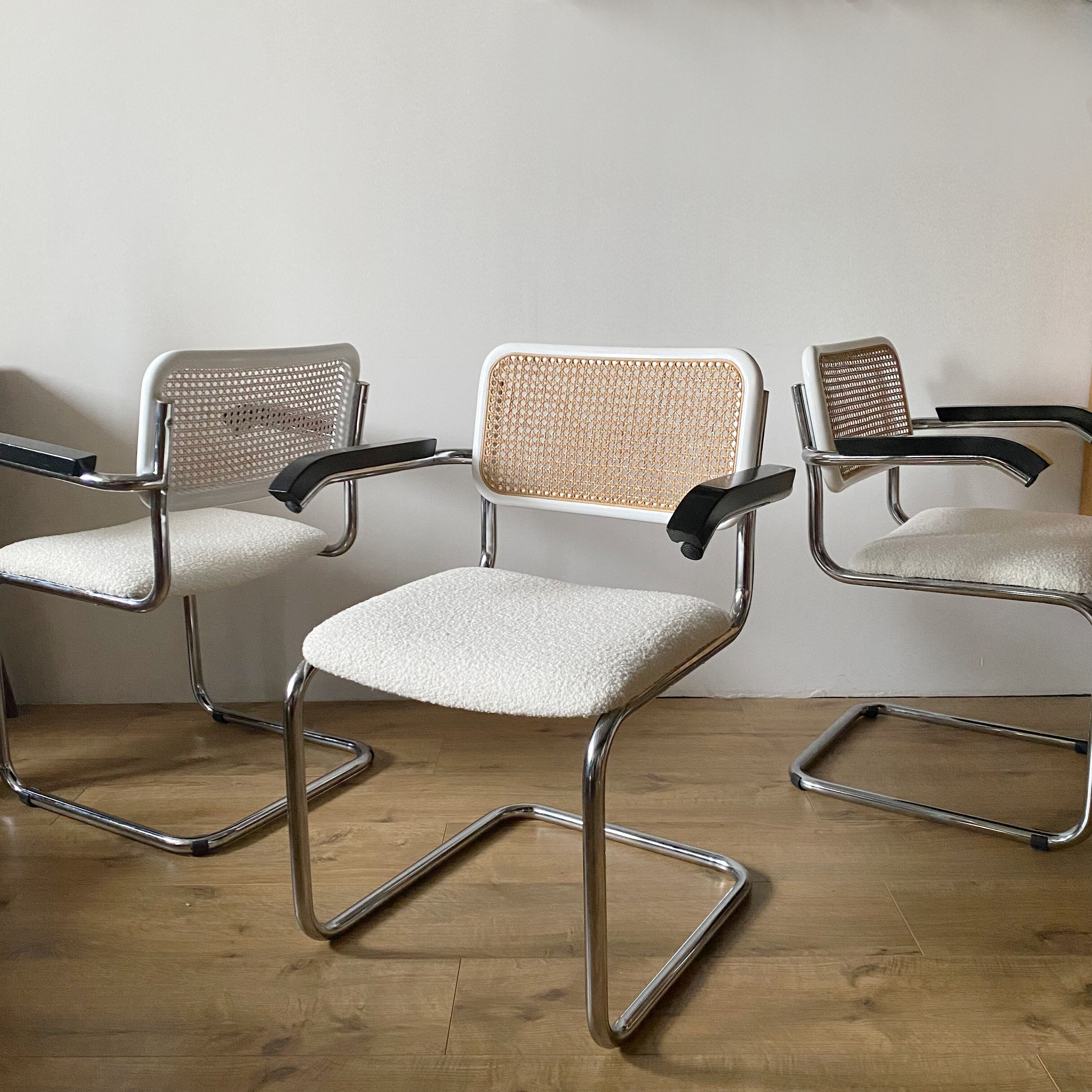 Cantilever armchair in cane and bouclette fabric